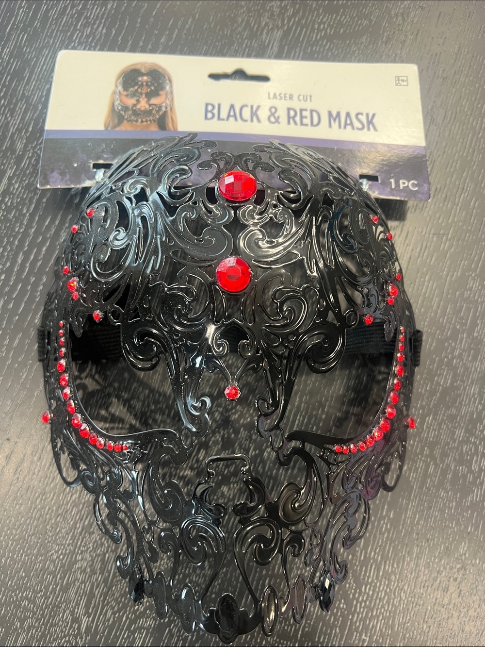 Black Laser-Cut Face Mask with Red Gem Accents